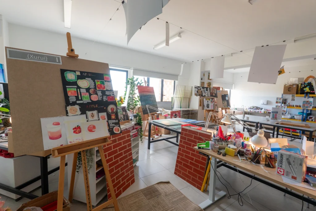 The art room, with student work on display at the easels.