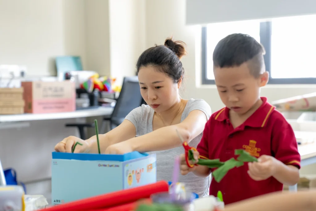 Parents and students take part in a STEAM activity together at Concord College.