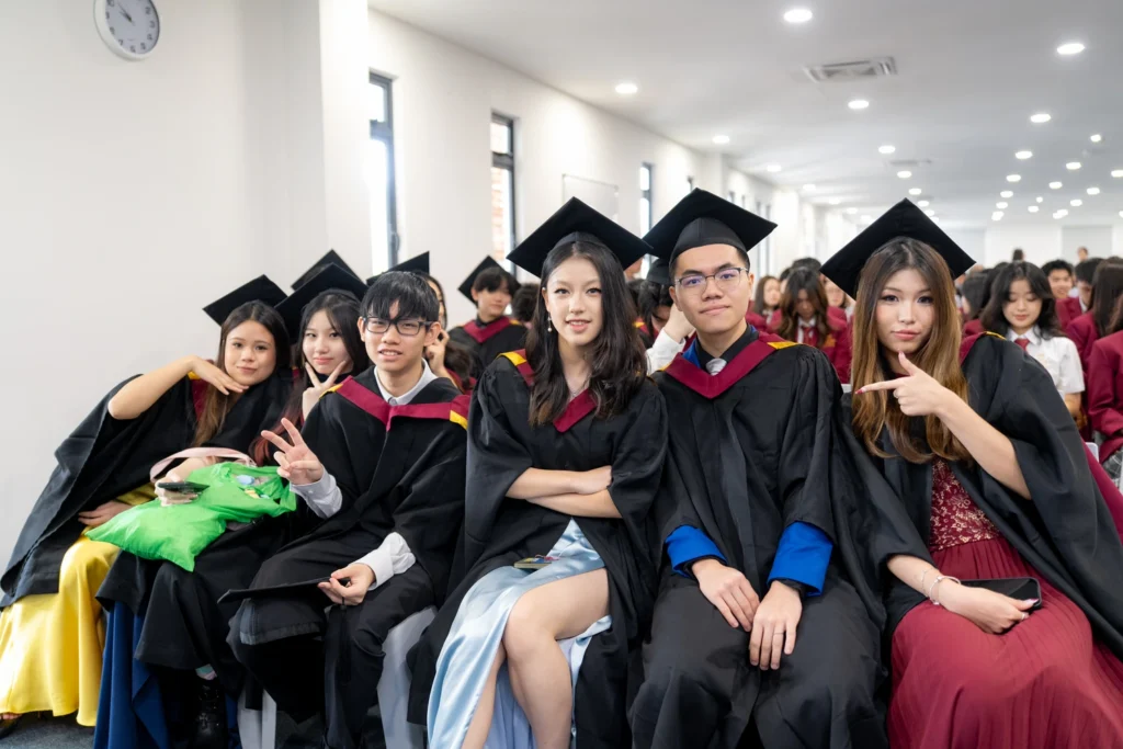 Rows of Year 13 graduates in caps and gowns at the ceremony.