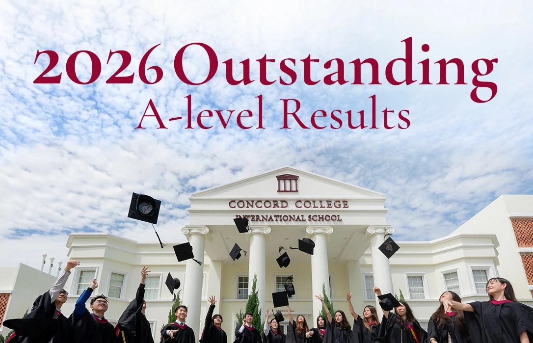 Concord College International School graduates throw their caps in the air outside the main building, under the words 2026 Outstanding A-Level Results.