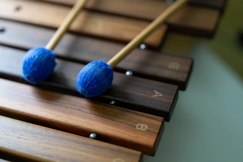 Beaters resting on a tuned percussion instrument in the music classroom.