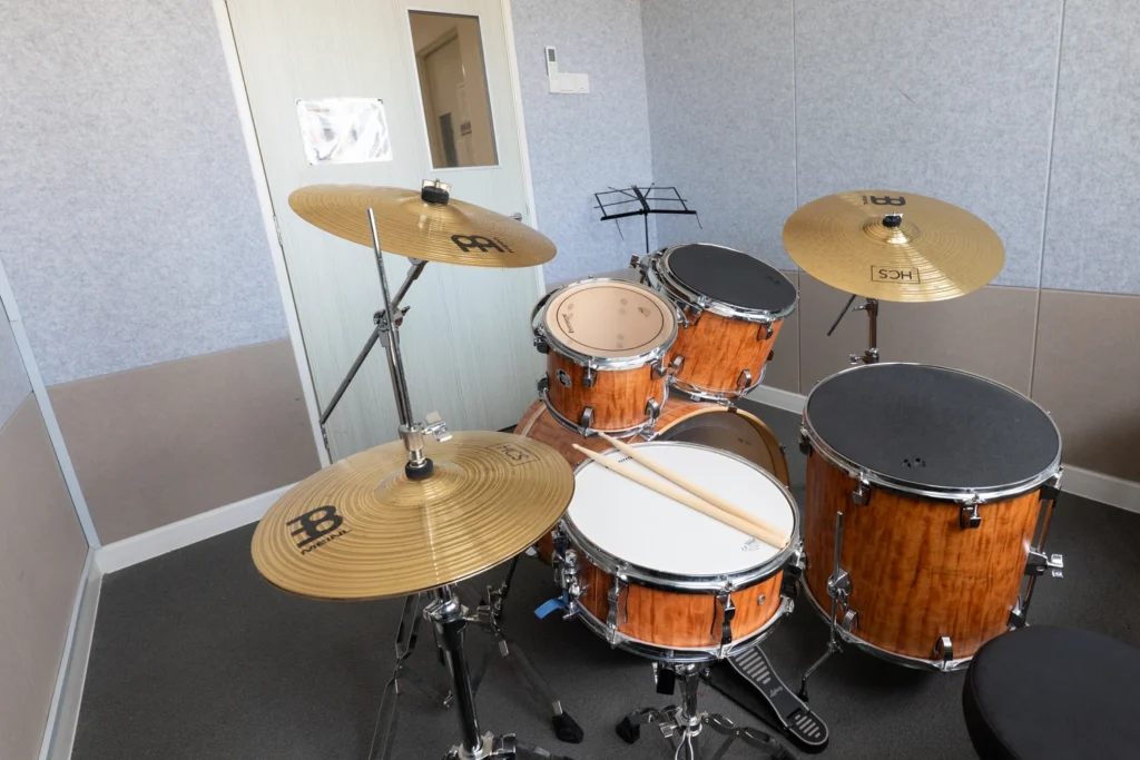 A drum kit set up in one of the acoustically treated music practice rooms.